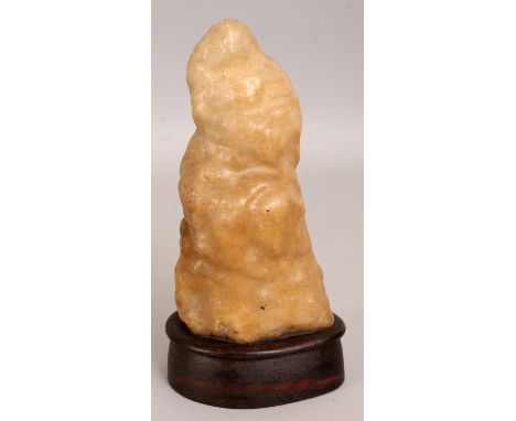 AN UNUSUAL 18TH/19TH CENTURY CHINESE STALACTITE SCHOLARS BOULDER, together with a fixed wood stand, 8.1in high overall.