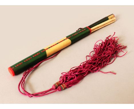 AN UNUSUAL ORIENTAL STAINED BONE CHOPSTICK SET, the sectional pieces natural and also stained red or green, 10.25in long when