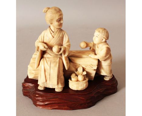 A GOOD QUALITY 19TH CENTURY JAPANESE MEIJI PERIOD SECTIONAL IVORY OKIMONO, unsigned, depicting an elderly lady seated on a tr