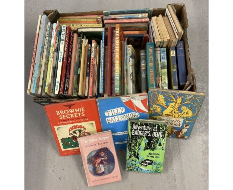 A box of assorted vintage children's books. To include: 1950's Tin Tin book, 1960's Babar book, Michael Bond Paddington books