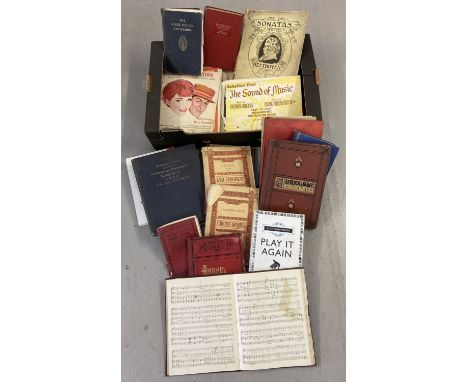 A box of vintage sheet music, song books, scores and sonatas.