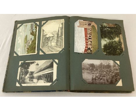 A vintage album containing a collection of 148 antique and vintage greetings cards and postcards. To include handpainted RP's
