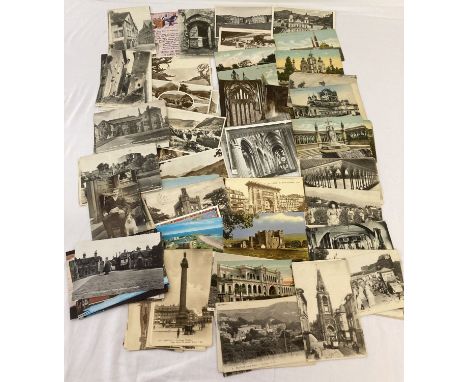 A collection of 127 antique and vintage postcards depicting British, French and Indian buildings, Rural areas and destination
