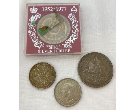 4 vintage coins. A 1935 "Rocking Horse" George V crown coin. Together with 2 x George VI two shilling coins 1939 and 1945 and