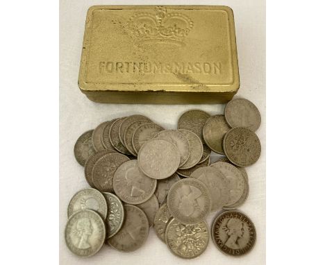 A small vintage Fortnum &amp; Mason tin containing 38 Elizabeth II sixpence coins.