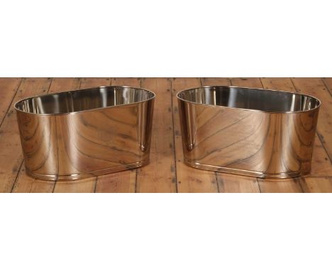 A pair of metal wine baths, of oval shape, 64cm wide (2)