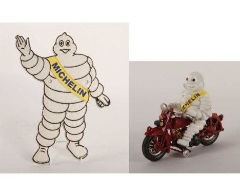 A painted cast iron Michelin Man sign, together with another on a motorbike (2)sign h. 35cm, figure h. 16cm, l. 21cm
