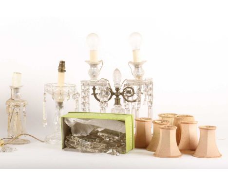 A cut crystal and brass twin branch table lamp, 36cm high, together with two further cut glass table lamps and various cut gl