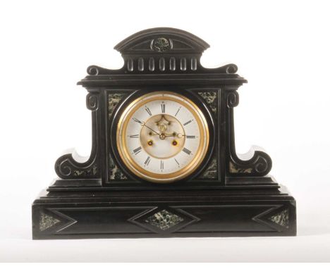 A large French black slate mantel clock, late 19th century, the eight day movement with visible anchor escapement, striking o