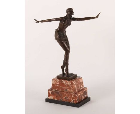 After Chiparus, a modern bronze Art Deco style figure of a dancer, on a stepped marble base, 50cm high