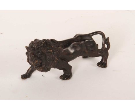 A bronze model of a lionlength 15cm