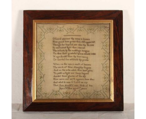 A Regency needlework sampler, dated 1828, worked with verse, housed in a rosewood frame31 x 30cm