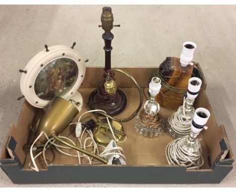 A quantity of vintage lamp bases to include glass, metal & wood.  