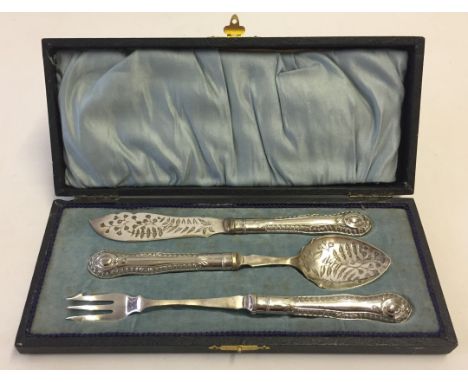 A cased silver plated condiment set of cutlery. Comprising pickle fork, preserve spoon, and butter knife. 
