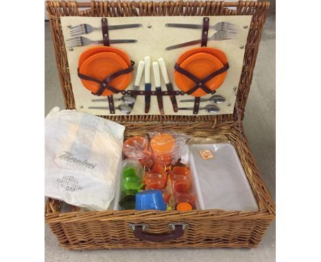 A vintage picnic hamper. Complete with original contents. 