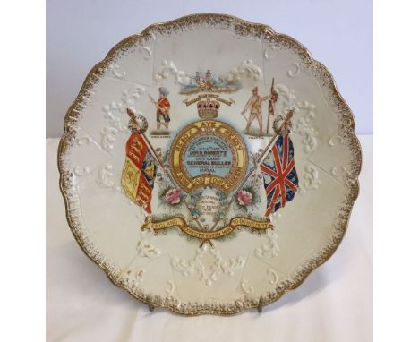 A Boer War commemorative ceramic plate. Reads 'Ready Aye Ready, God save our Queen'. Slight hairline crack. 