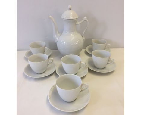 A Royal Copenhagen coffee pot with 6 cups & saucers. Half white lace pattern.  