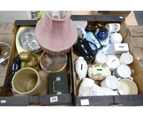 A mixed collection of ceramic items to include mantle clocks, war themes commemorative mugs and trinket boxes, novelty money 