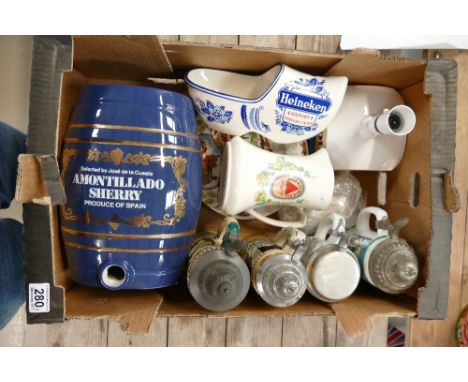 A mixed collection of beer and sherry advertising pub items to include Skol lamp base, Bass & Co water jug, Heineken ash tray