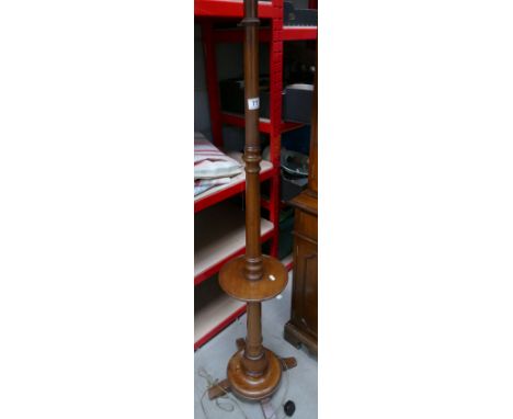 A reproduction standard lamp.