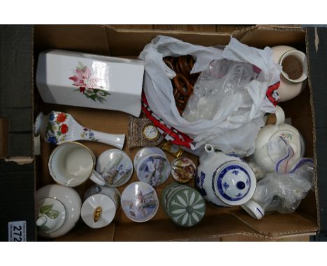 A mixed collection of ceramic items to include Wedgwood Sage Green lidded pot, decorative small mantle clocks, Ringtons Wade 