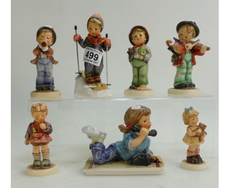 A collection of Goebel Hummel figures to include Boy Skiing no. 59, Today's Children, Serenade, Little Fiddler, Lost Stocking