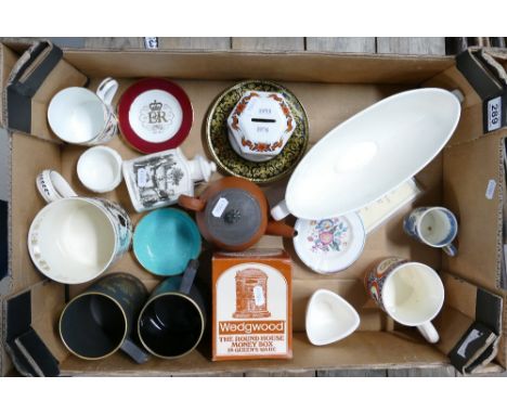A mixed collection of ceramic items to include early red Wedgwood tea pot (nip to spout), commemorative mugs, etc. 