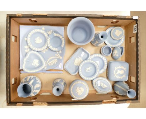 A good collection of Wedgwood Jasper ware items to include boxed commemorative plates, pin trays, vases, trinket boxes, etc. 