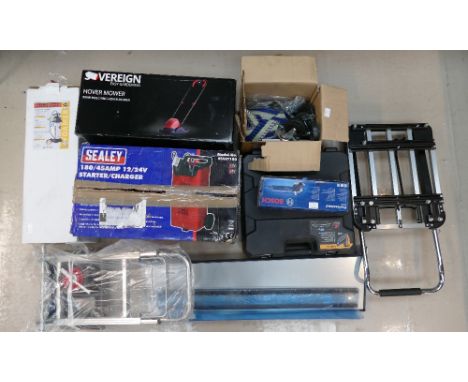 A large mixed collection of electrical equipment to include 8L Foamer, starter charger, Bosch angle grinder, electric Bostitc