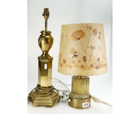 Large brass column type table lamp and similar smaller item with hand decorated parchment shade. (2)