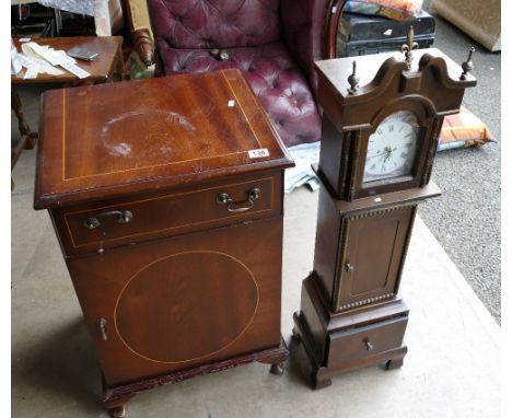 A reproduction Victorian styled inlaid cross banded side cabinet with a small reproduction cabinet/clock. (2)