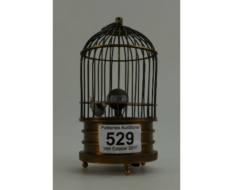 Brass bird cage clock in working order.