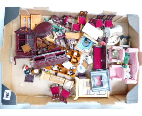 A mixed collection of Dolls house furniture, including fire places, side boards, settee's, grandfather clock, etc.