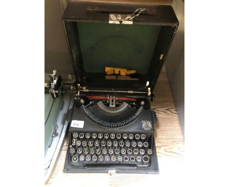 A cased  vintage Imperial typewriter 