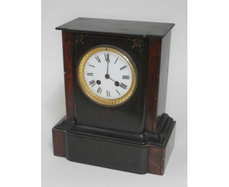 A late 19th century black slate mantel clock, height 28cm. 