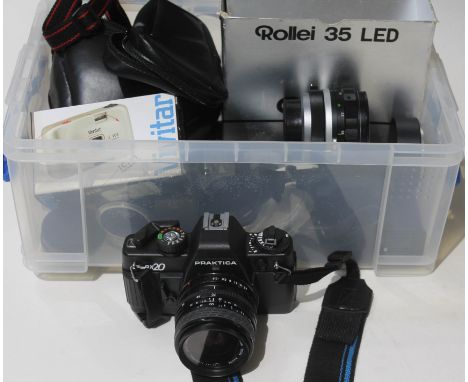 A Praktica 35mm camera and various accessories. 