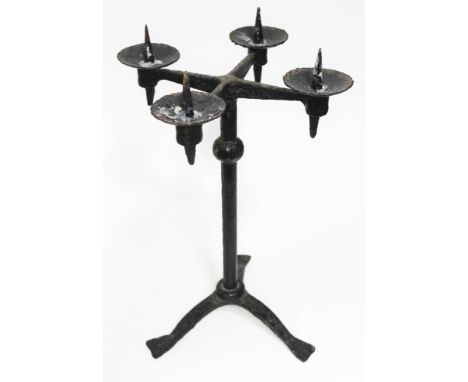 A wrought metal pricket candlestick, height 44cm. 