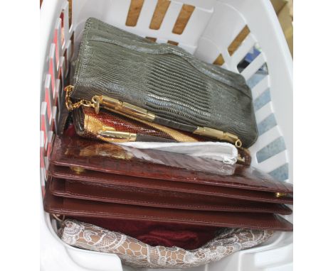A crate of vintage handbags. 