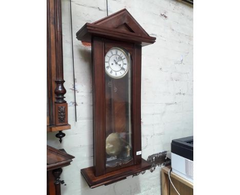 A mahogany Vienna clock with Gustav Becker movement. 