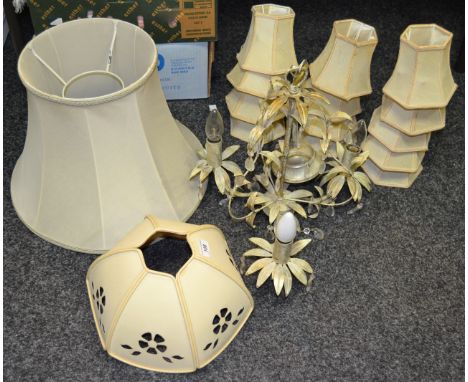 A white painted three branch light fitting; light shades
