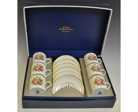 A Royal Worcester coffee service for six, printed with bouquet of flowers, boxed