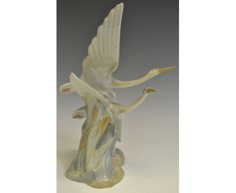 A LLadro Nao figure, Two Cranes in Flight, wavy clouds, impressed marks