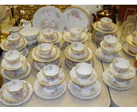 An early to mid 20th century Continental tea service , printed with pink flowers 