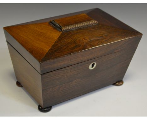 A Victorian rosewood sarcophagus tea caddy, hinged cover enclosing a pair of lidded compartments, c.1850