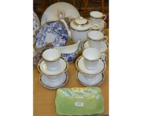 A Royal Worcester Raffles pattern coffee service, for six; a Royal Crown Derby Mikado pattern sauce boat and plate; a Beswick