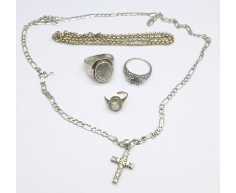 A silver 'poison' ring, part gold ring set with opal, a/f, two silver chains, a silver cross pendant and a silver ring lackin