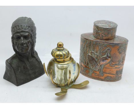 A Chinese embossed copper plated tea caddy, a bronze bust of a Native American and a brass and glass inkwell, a/f 