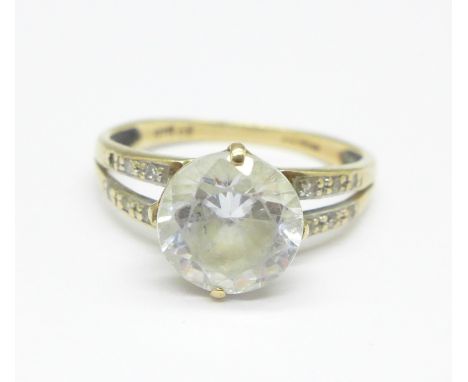 A 9ct gold and cubic zirconia ring, 2.1g, K, lacking one small stone on the shoulder 