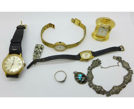 A Rotary wristwatch, two other watches, jewellery and a small clock 