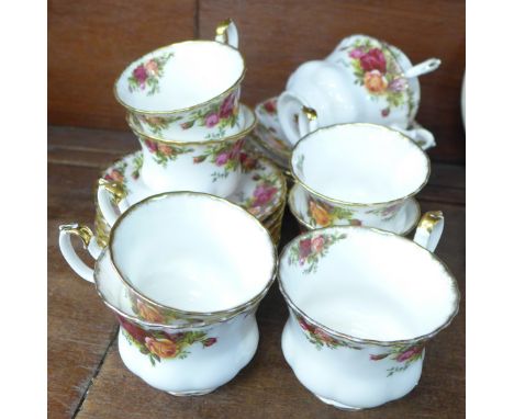 Royal Albert Old Country Roses china, nine cups and thirteen saucers 